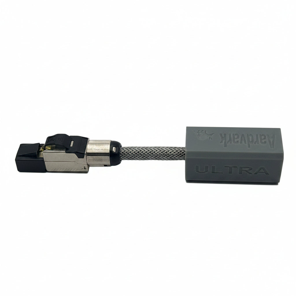 A gray and black Artvark ULTRA braided cable connector on a plain white background.